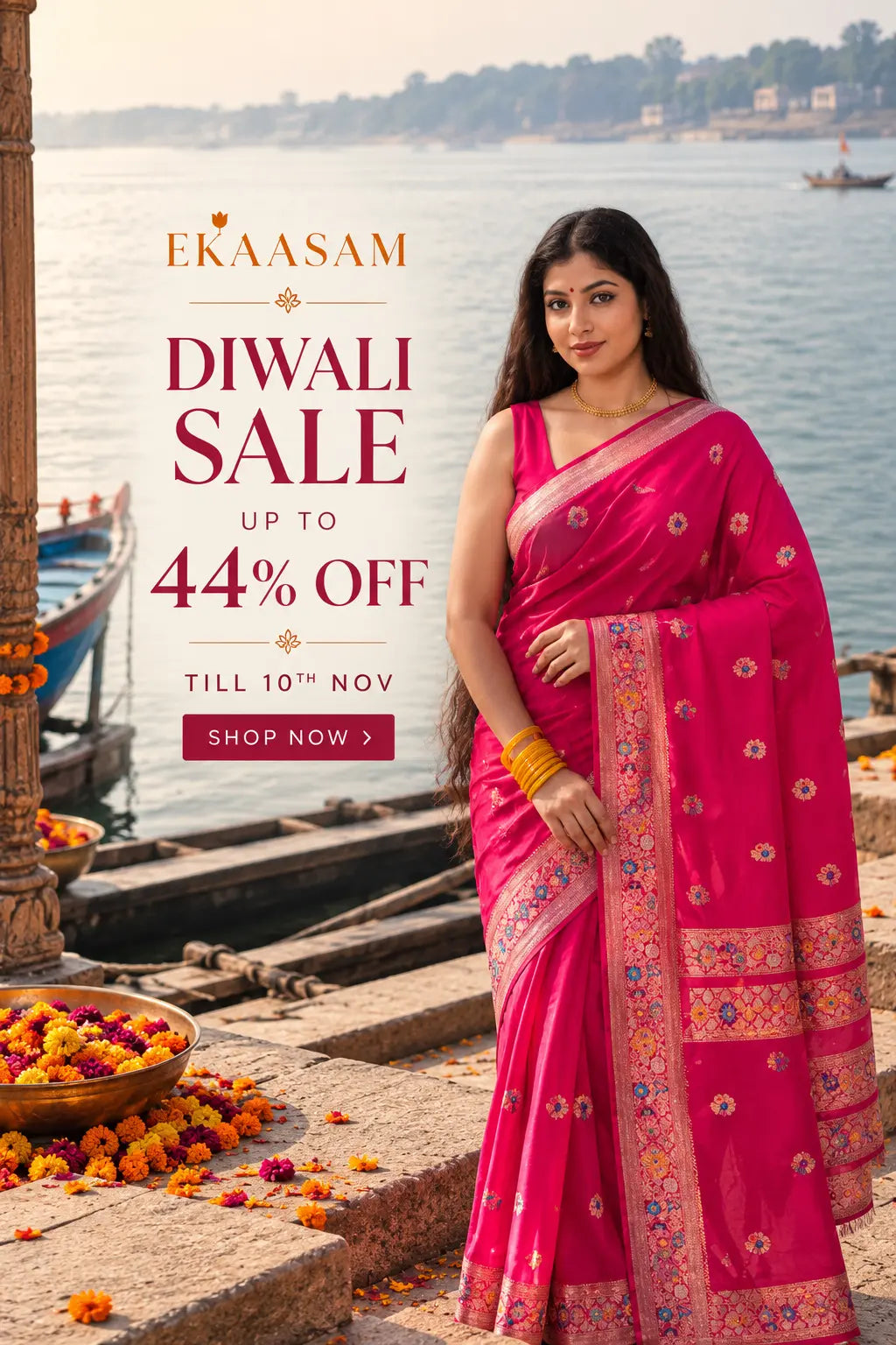 A woman wearing a bright pink saree with floral embroidery stands by the water during a Diwali sale advertisement. The ad includes the brand name EKAASAM and text reading 'DIWALI SALE UP TO 44% OFF' with a 'SHOP NOW' button.